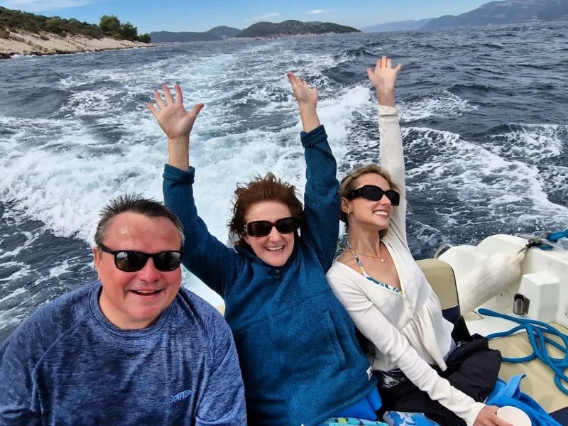 Guests entering the Blue Cave by boat
